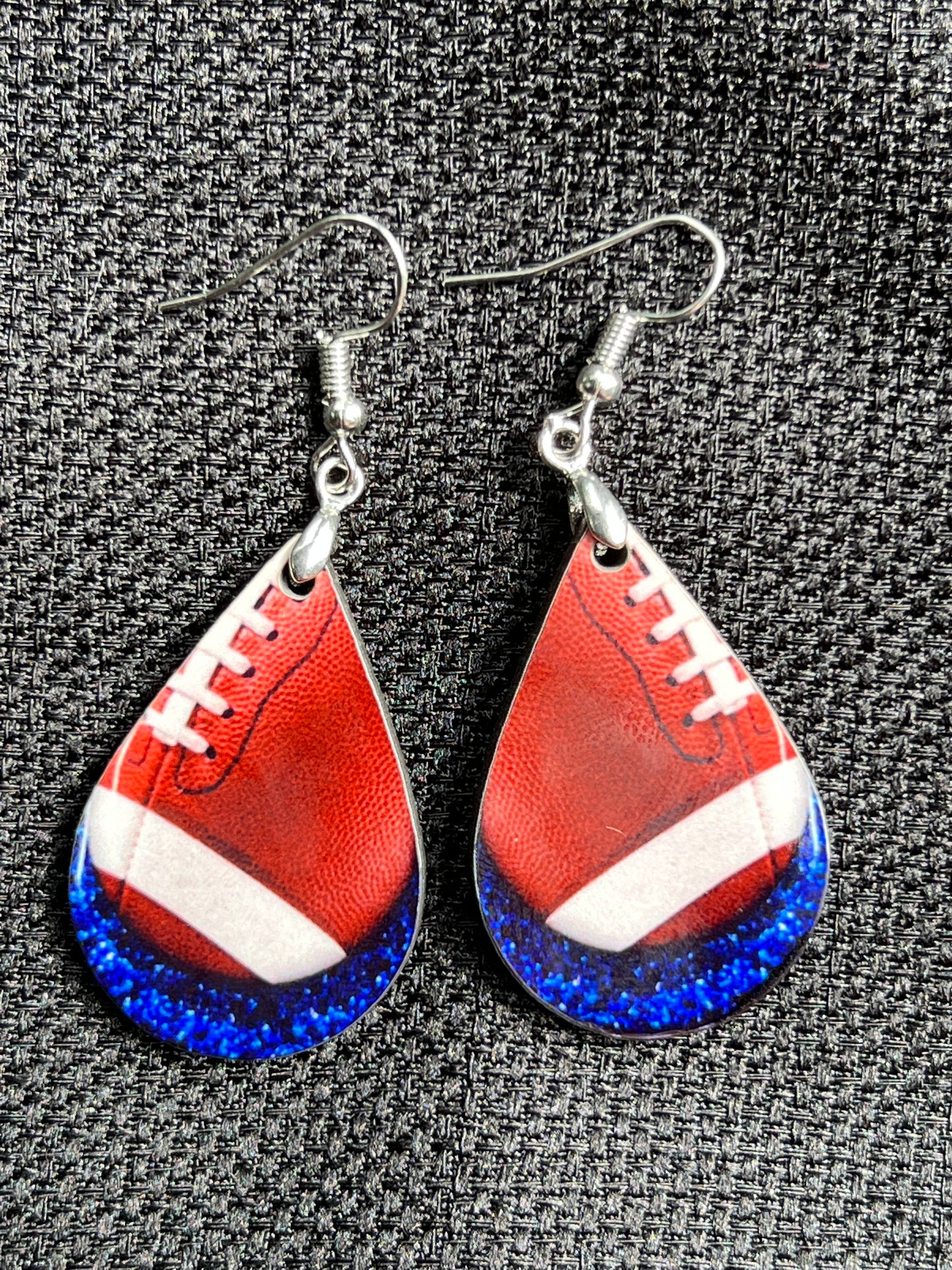 Football Teardrops With Blue Background