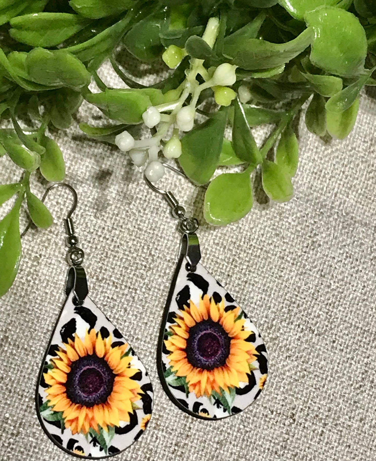 SUNFLOWER WITH COW PRINT TEARDROPS